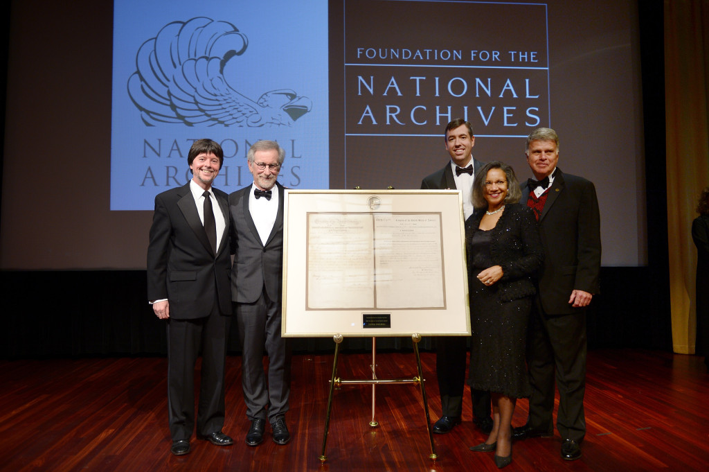 (L-R) Foundation for the National Archives Board Vice President and Gala Chair Ken Burns, filmmaker and honoree Steven Spielberg, Executive Director of the Foundation for the National Archives Patrick Madden, Foundation for the National Archives Chair and President A'Lelia Bundles, and Archivist of the United States The Honorable David S. Ferriero pose onstage with facsimile versions of the "two 13th Amendments" at the Foundation for the National Archives 2013 Records of Achievement award ceremony and gala in honor of Steven Spielberg on November 19, 2013 in Washington, D.C. (Photo by Michael Loccisano/Getty Images for Foundation for the National Archives).