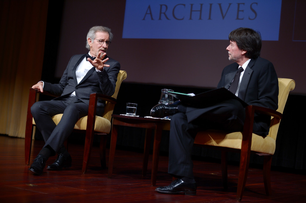 Filmmaker and honoree Steven Spielberg (L) and Foundation for the National Archives Board Vice President and Gala Chair Ken Burns speak onstage at the Foundation for the National Archives 2013 Records of Achievement award ceremony and gala in honor of Steven Spielberg on November 19, 2013 in Washington, D.C. (Photo by Michael Loccisano/Getty Images for Foundation for the National Archives)