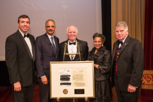 National Archives Foundation Executive Director Patrick M. Madden, former Attorney General Eric Holder, Records of Achievement Award honoree Taylor Branch, Foundation Chair A'Lelia Bundles, and Archivist of the United States David S. Ferriero with the 2015 Records of Achievement Award, featuring facsimilies of a redacted document from Mr. Branch's Freedom of Information Act (FOIA) lawsuit against the FBI, as well as a facsimile of that same document, which has recently been declassified. Photo by Pepe Gomez for the National Archives Foundation.